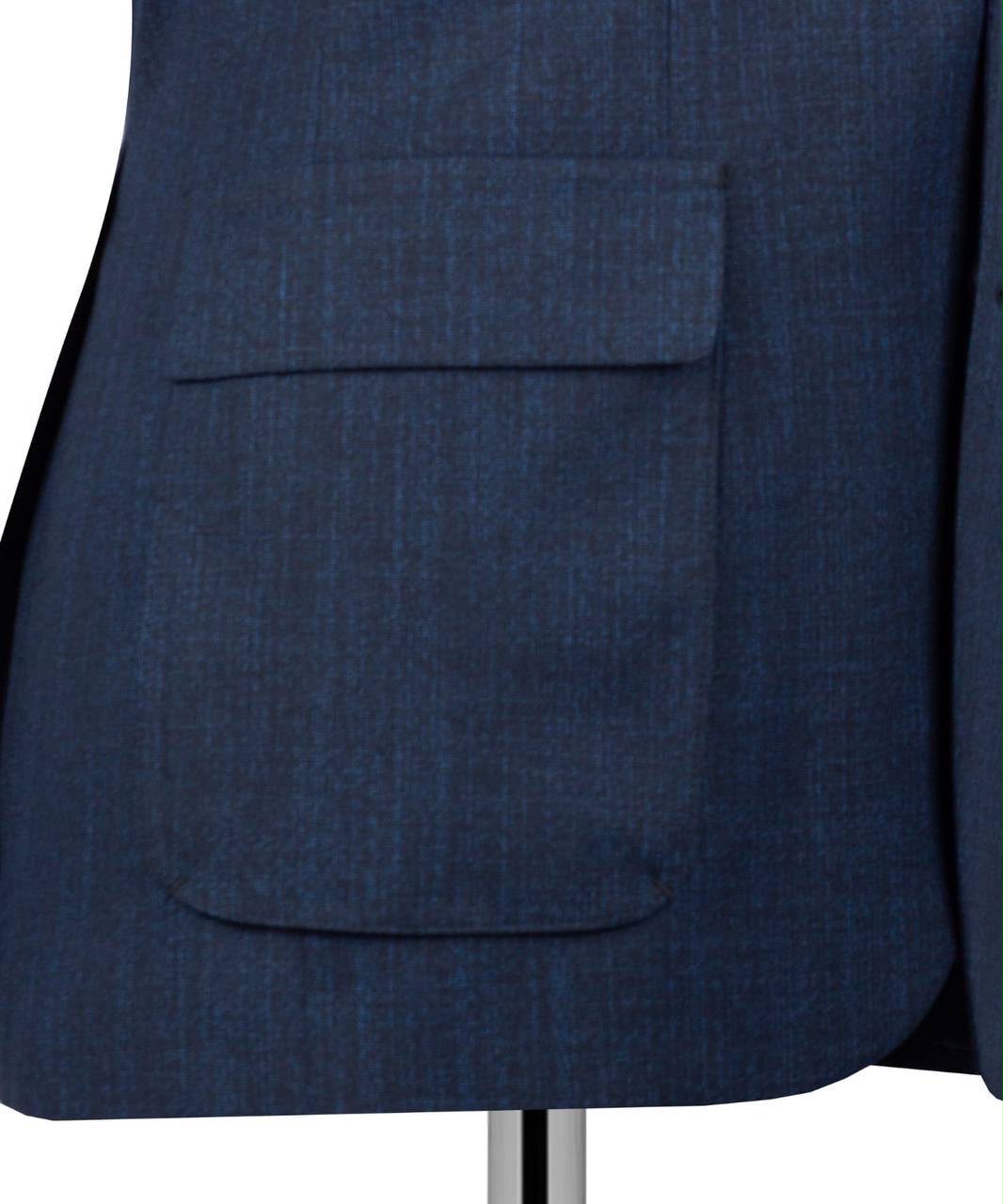 Close-up of a navy blue textured blazer jacket with a single front flap pocket, displayed on a mannequin torso against a white background.