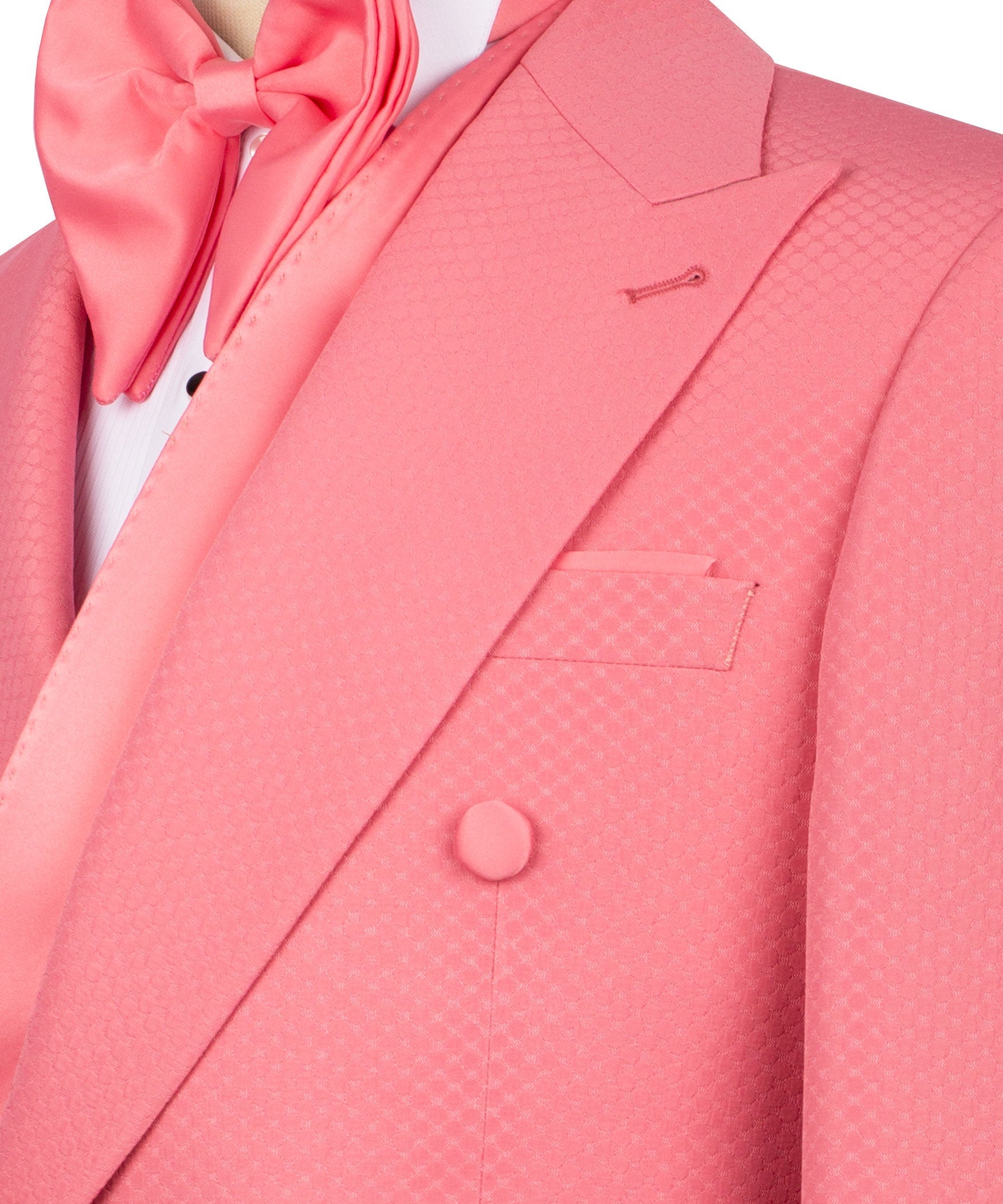 Close-up pink tuxedo jacket: shawl lapel, chest pocket, and double-breasted button
