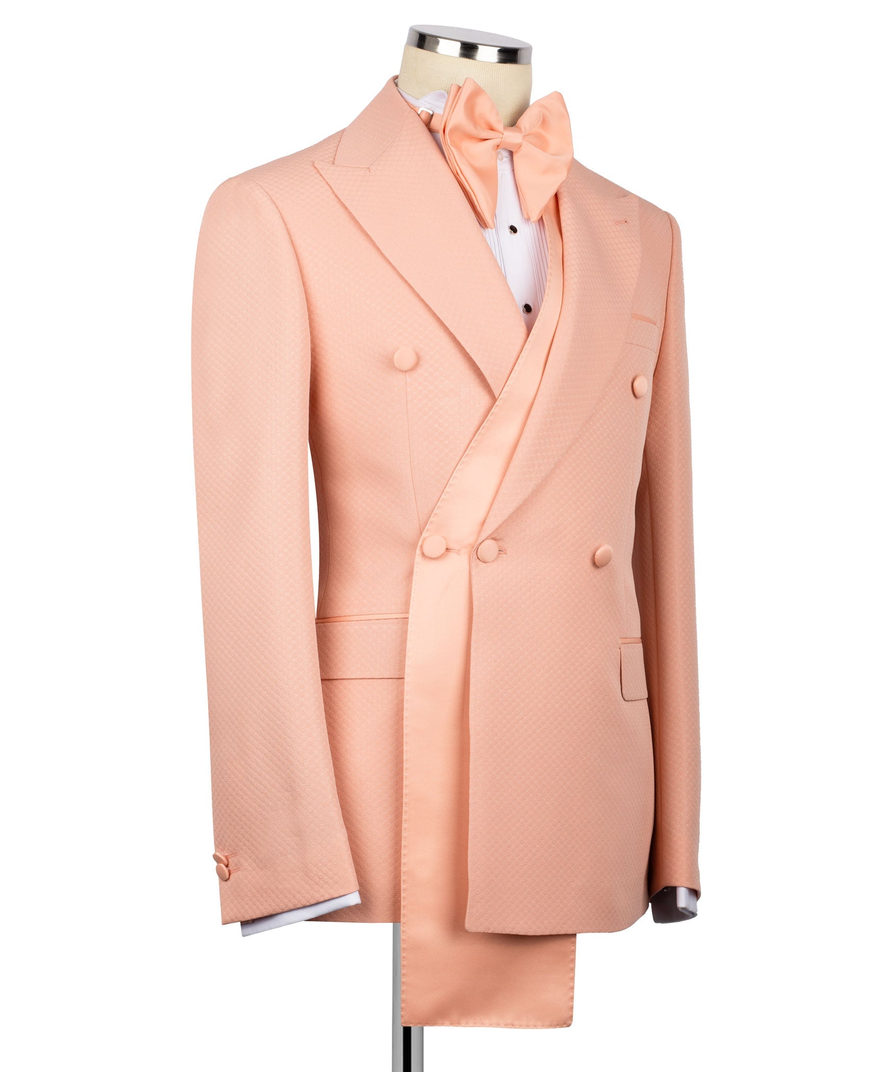 Peach tuxedo 3-piece set, side view with long shawl lapel jacket, bow tie, and vest