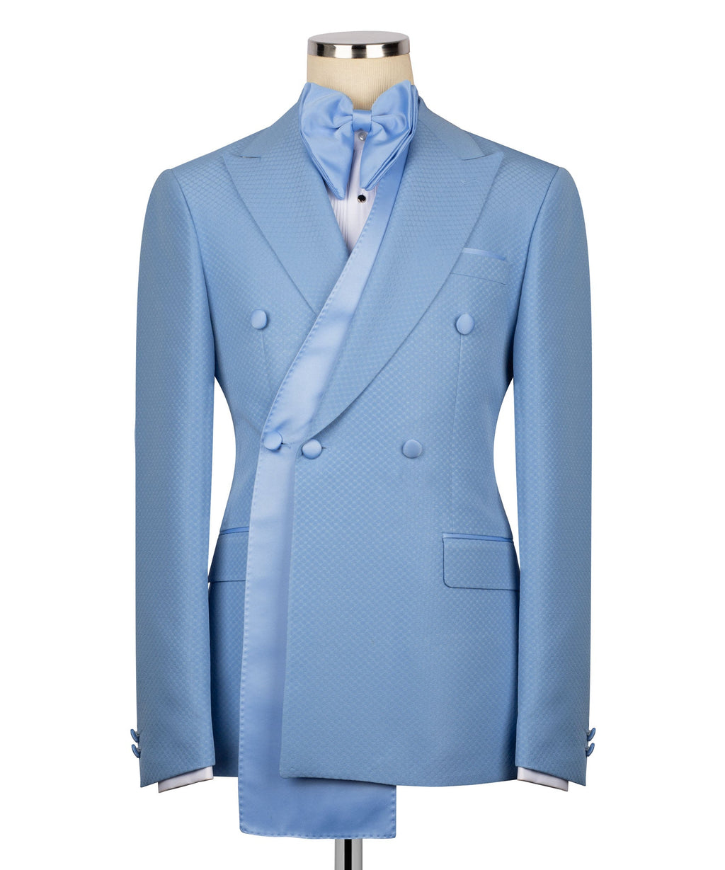 Light blue tuxedo jacket with long shawl lapels, bow tie, and vest