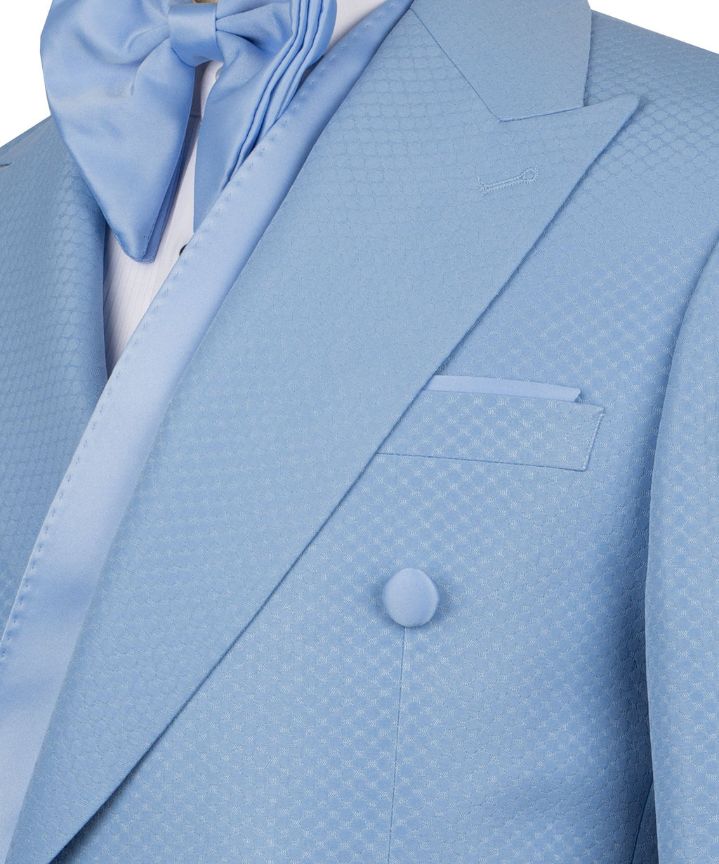 Close-up light blue tuxedo jacket: shawl lapel, chest pocket, vest buttons