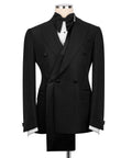 Black long shawl lapel tuxedo jacket with bow tie and matching vest