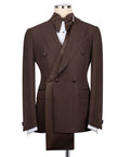 Brown tuxedo jacket with long shawl lapels, bow tie, and matching vest, three-piece set