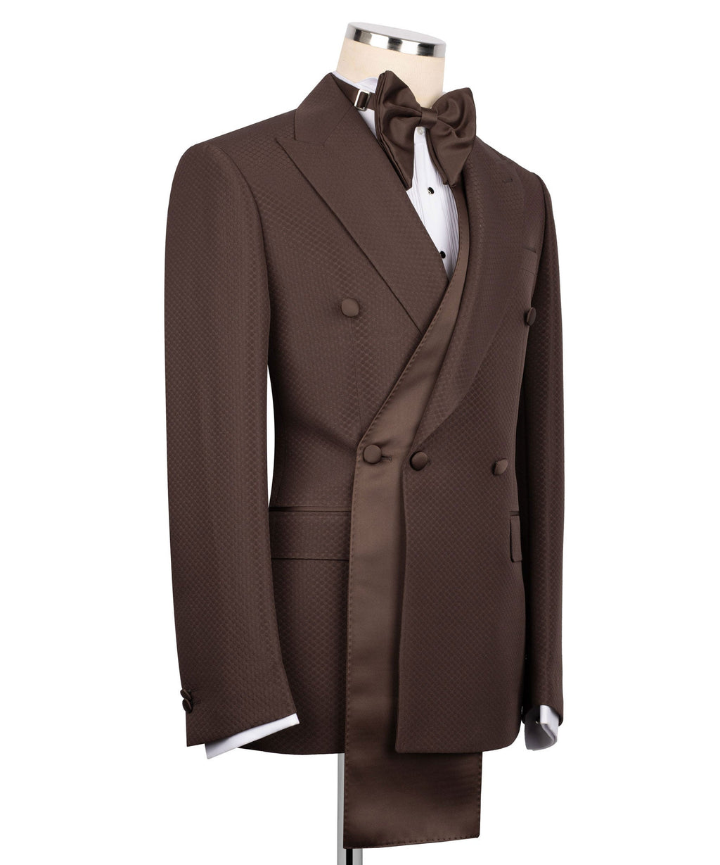 Side view of brown tuxedo jacket with shawl lapel and bow tie, plus vest and trousers