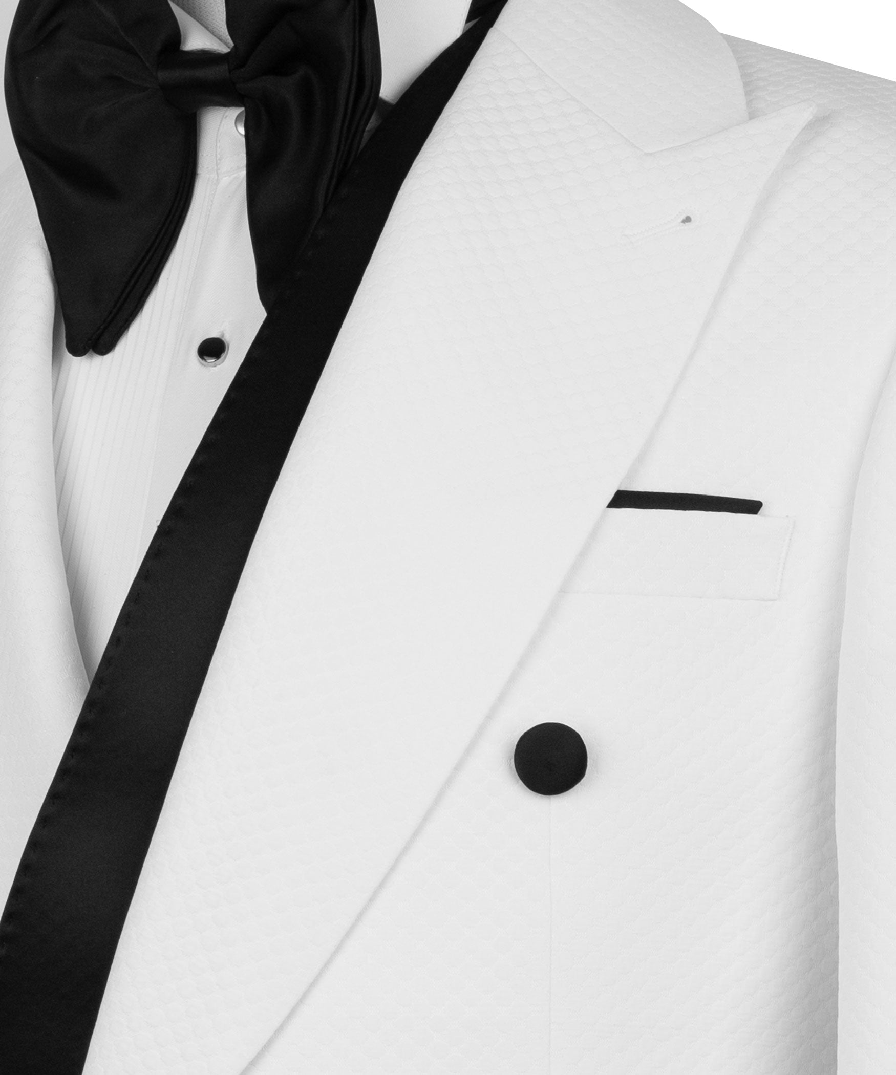 Close view: white tux jacket with black bow tie, satin trim, flap pocket and buttons