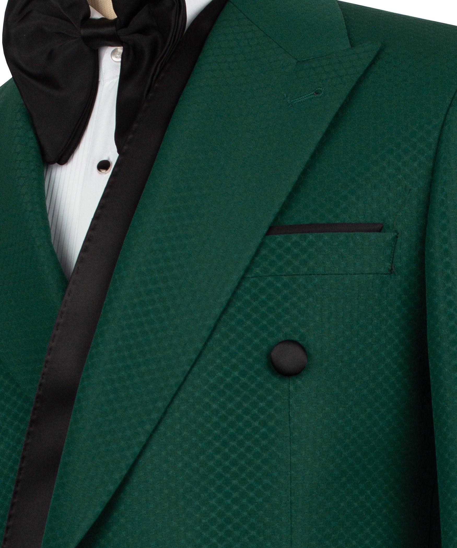 Close-up: green tuxedo lapel and pocket with black trim, textured fabric, button detail