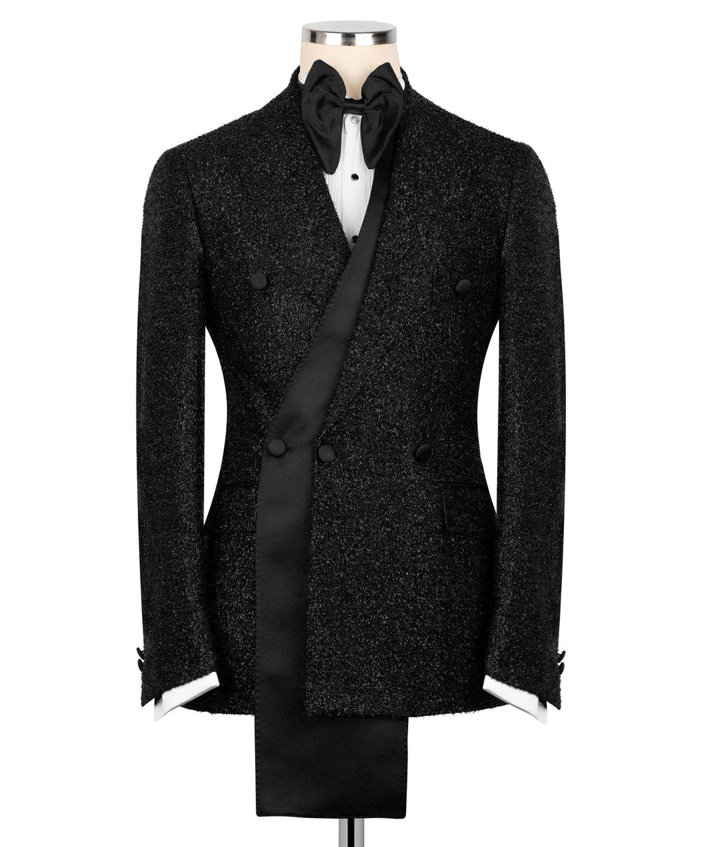 Black textured tuxedo jacket with long shawl lapels, buttons, and bow tie