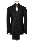 Black textured tuxedo jacket with long shawl lapels, buttons, and bow tie