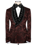 Burgundy tuxedo jacket with black stone-embellished lapels and matching bow tie