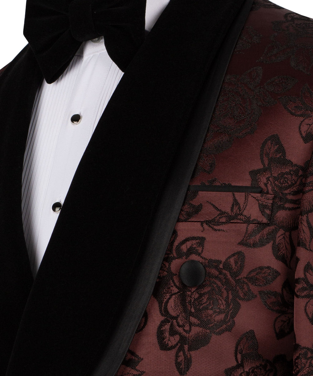 Close-up black tuxedo lapels, maroon rose print, double-breast buttons