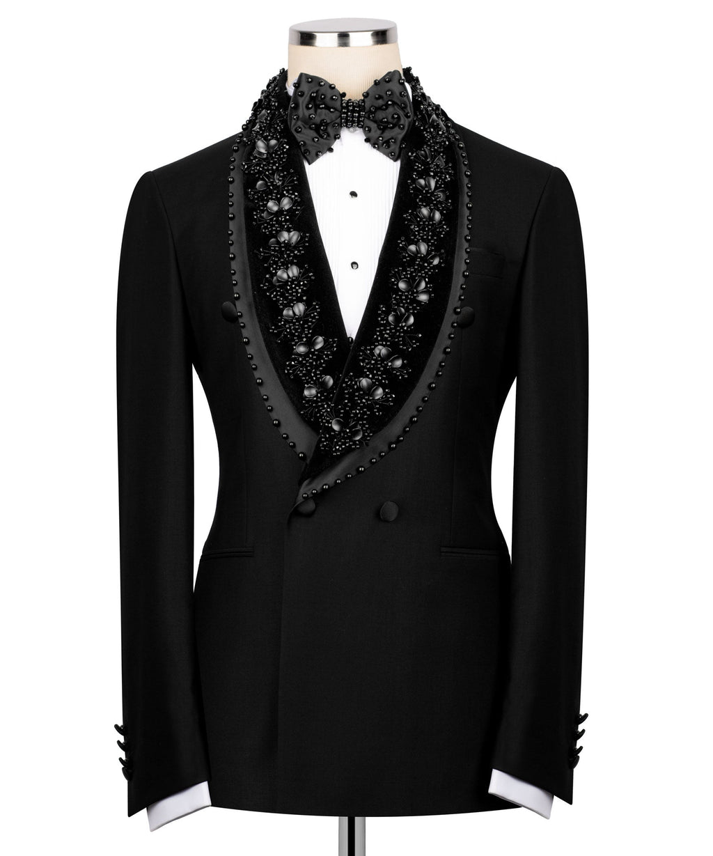Black tuxedo jacket with stone-embellished satin lapels and matching bow tie