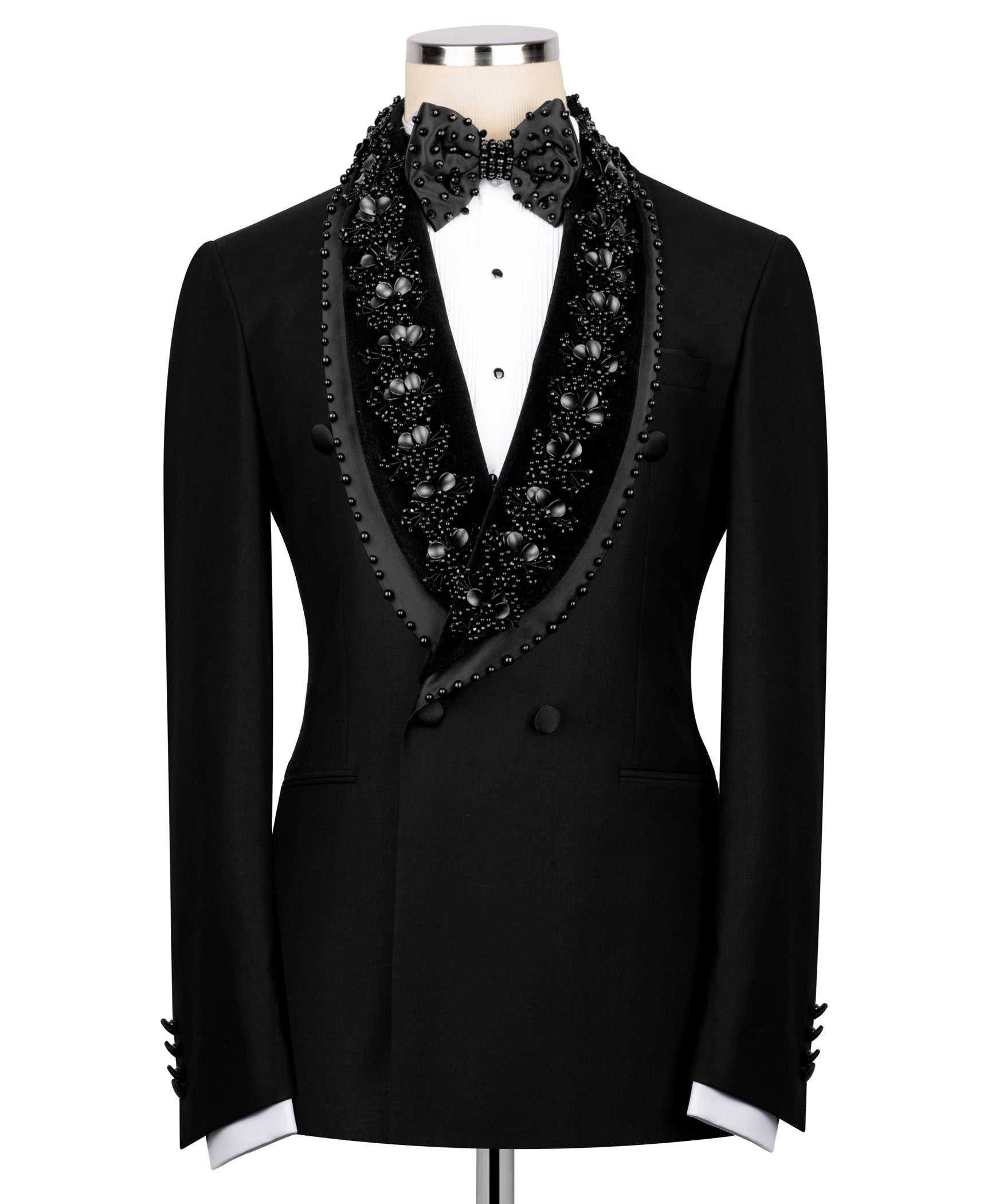 Black tuxedo jacket with stone-embellished satin lapels and matching bow tie