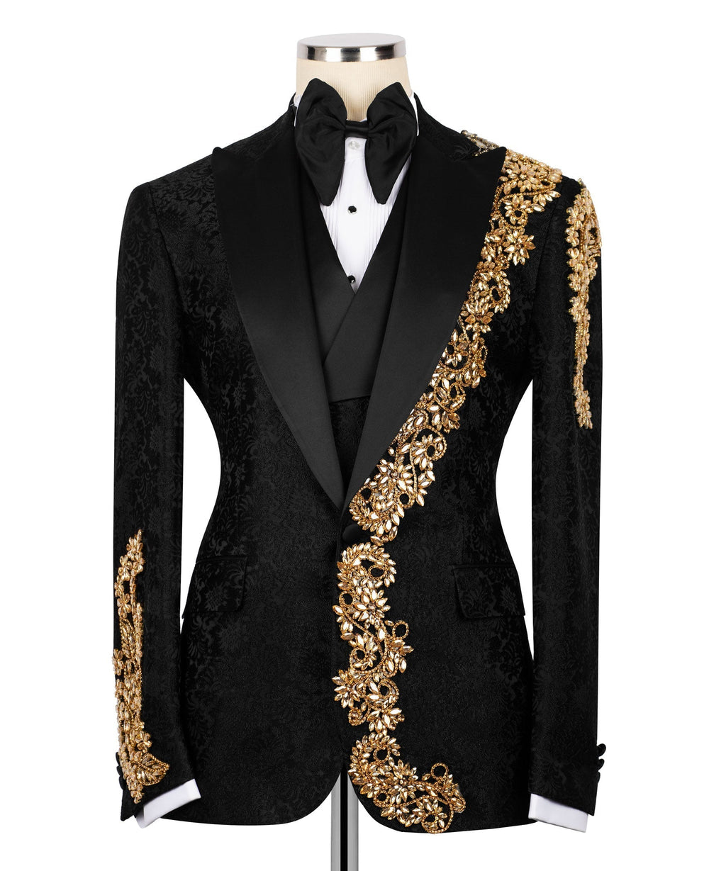 Black tuxedo jacket with gold stone-embroidered diagonal trim and bow tie