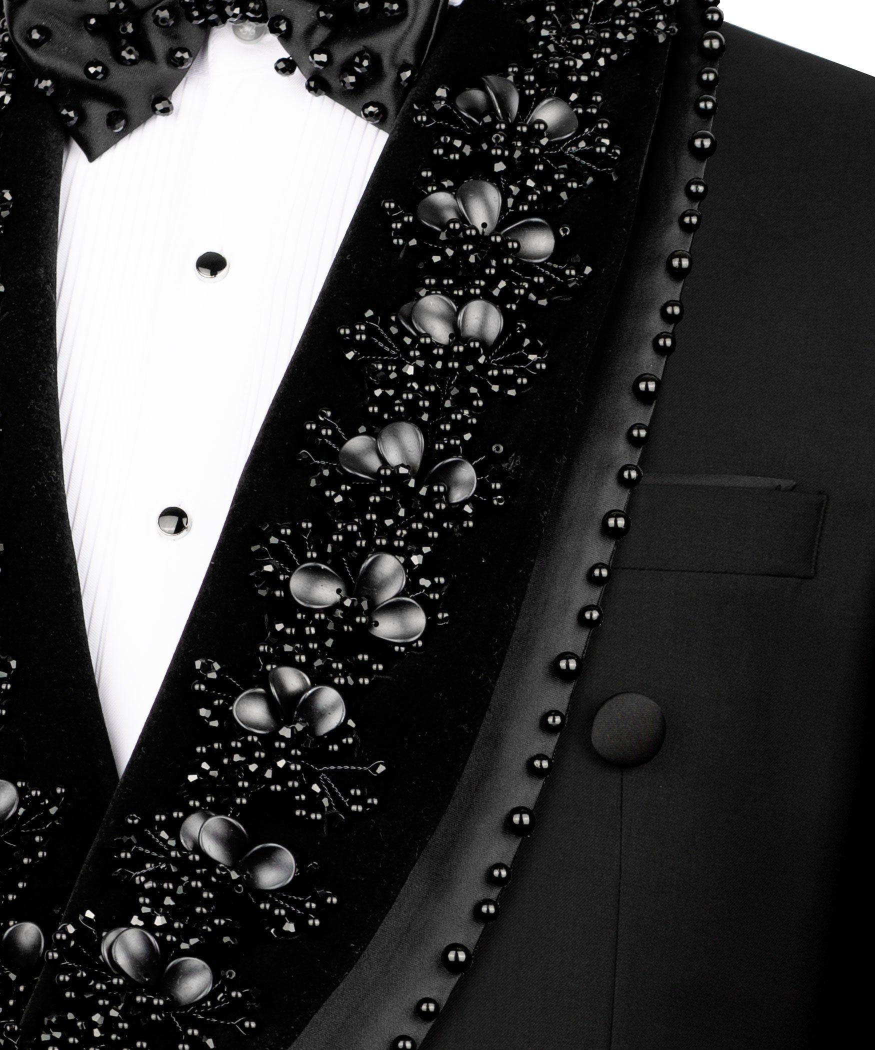 Close-up: black stone embroidery on tuxedo lapel with bead trim and button