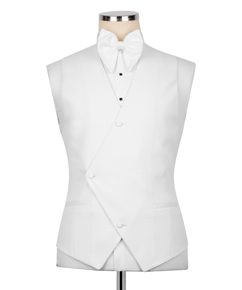 White matching waistcoat with bow tie and black buttons, on mannequin