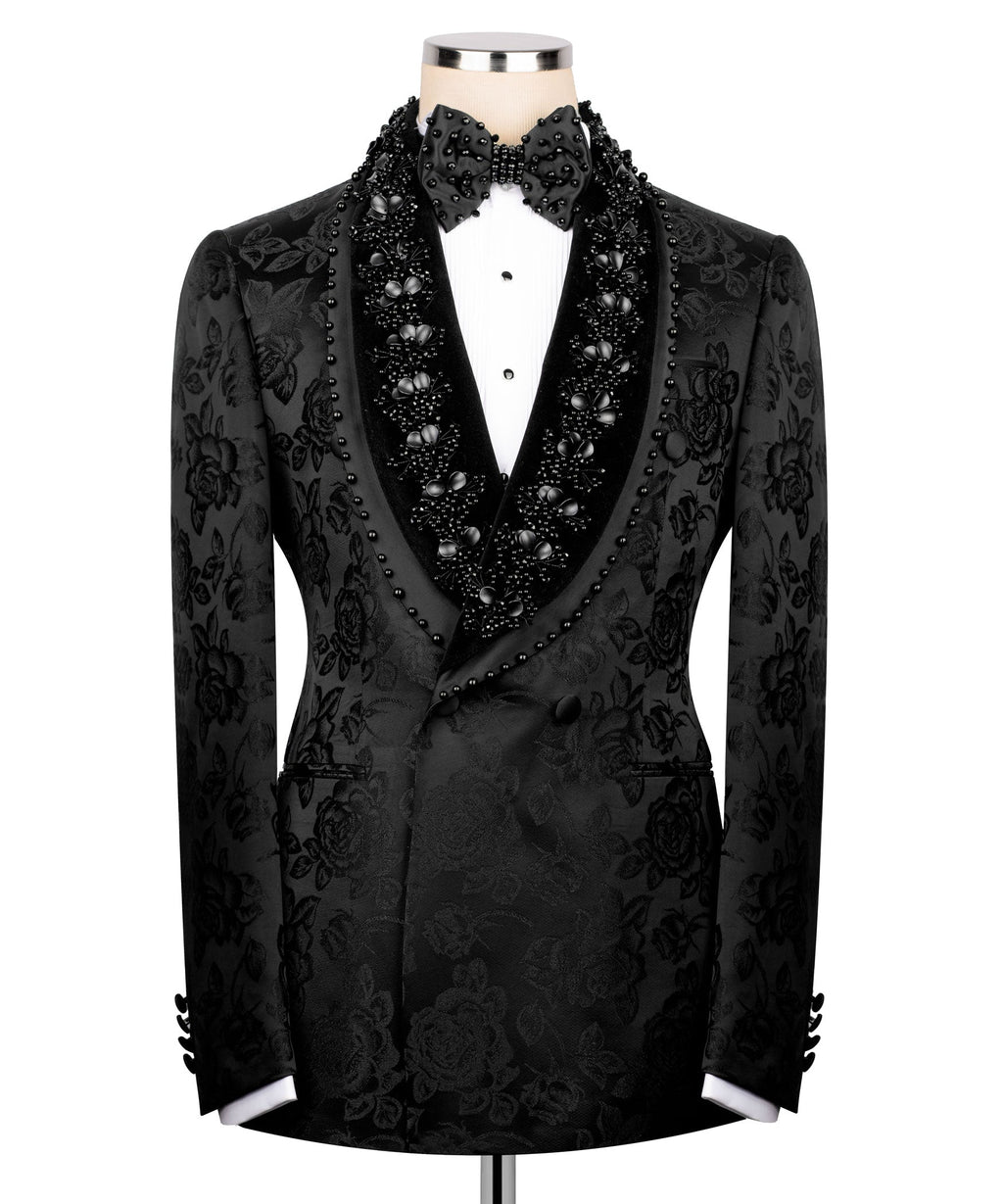 Black jeweled tuxedo jacket with floral embroidery, deep V satin lapels and stud trim