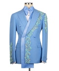 Blue embroidered jacket on a mannequin with a white background