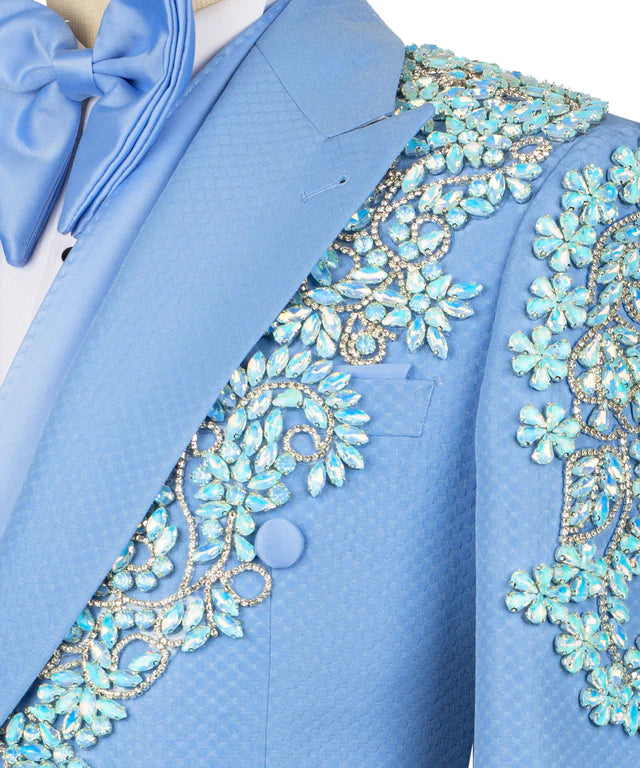 Blue tuxedo with intricate beadwork on a white background