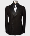 Black tuxedo jacket and waistcoat with bow tie; studded patterned lapel and buttons