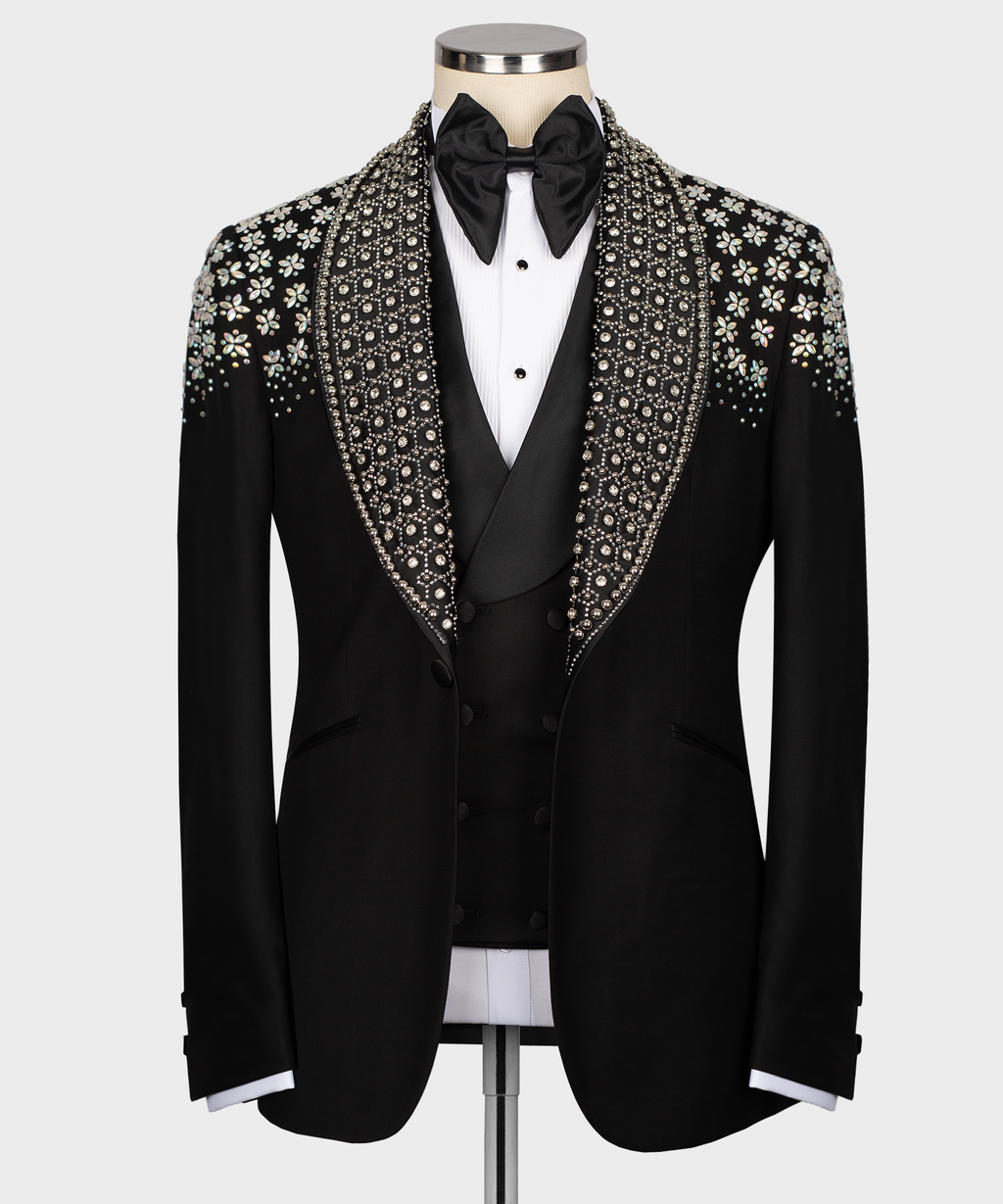 Black tuxedo jacket with white stone-embroidered lapels and satin bow tie, front view