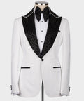 White tuxedo jacket with black stone-embroidered lapels and bow tie, front view