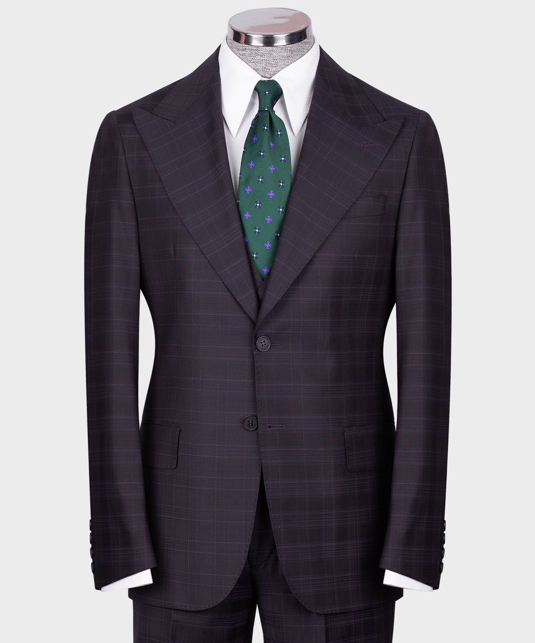 Navy plaid vest suit with white shirt and green patterned tie, single-breasted front