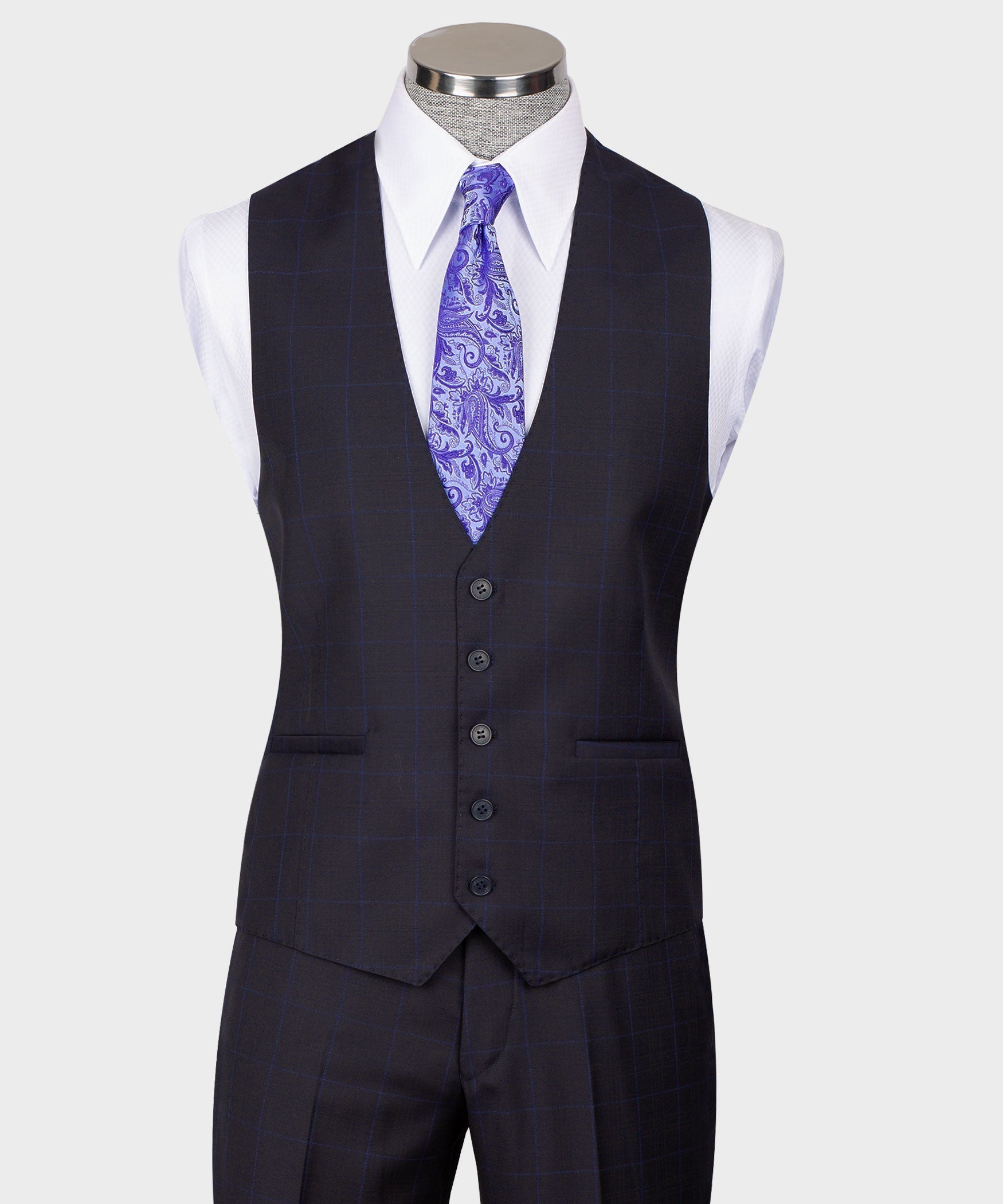 Navy windowpane vest suit with purple paisley tie; sleeveless vest with buttons