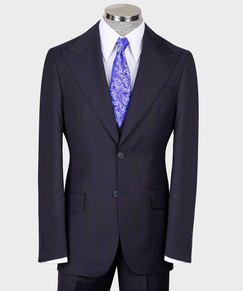 Men’s dark windowpane vest suit with purple paisley tie and matching jacket