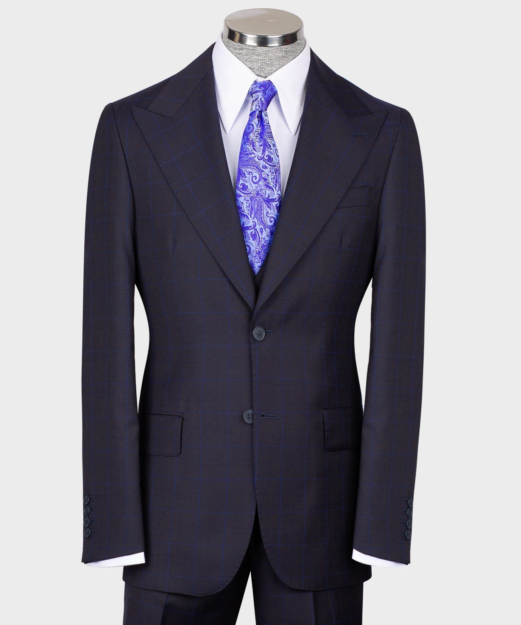 Men’s dark windowpane vest suit with purple paisley tie and matching jacket