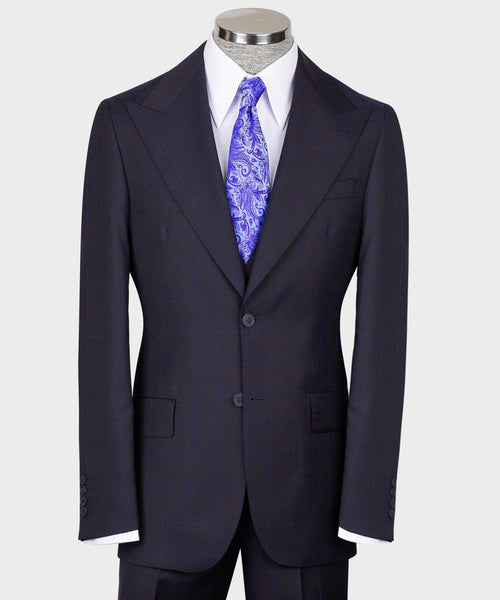 Men’s dark windowpane vest suit with purple paisley tie and matching jacket