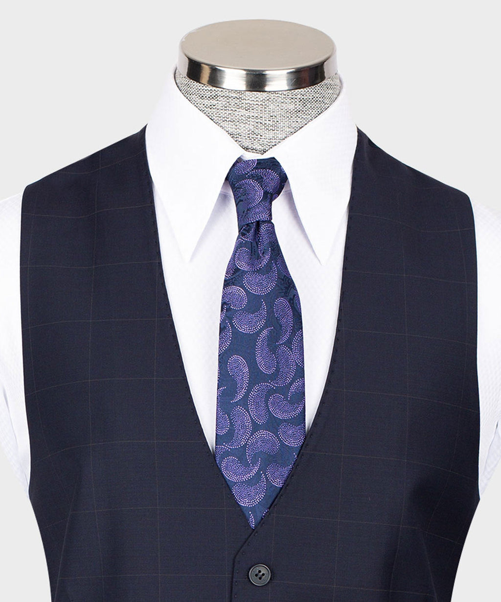 Navy vest with white dress shirt and purple patterned necktie