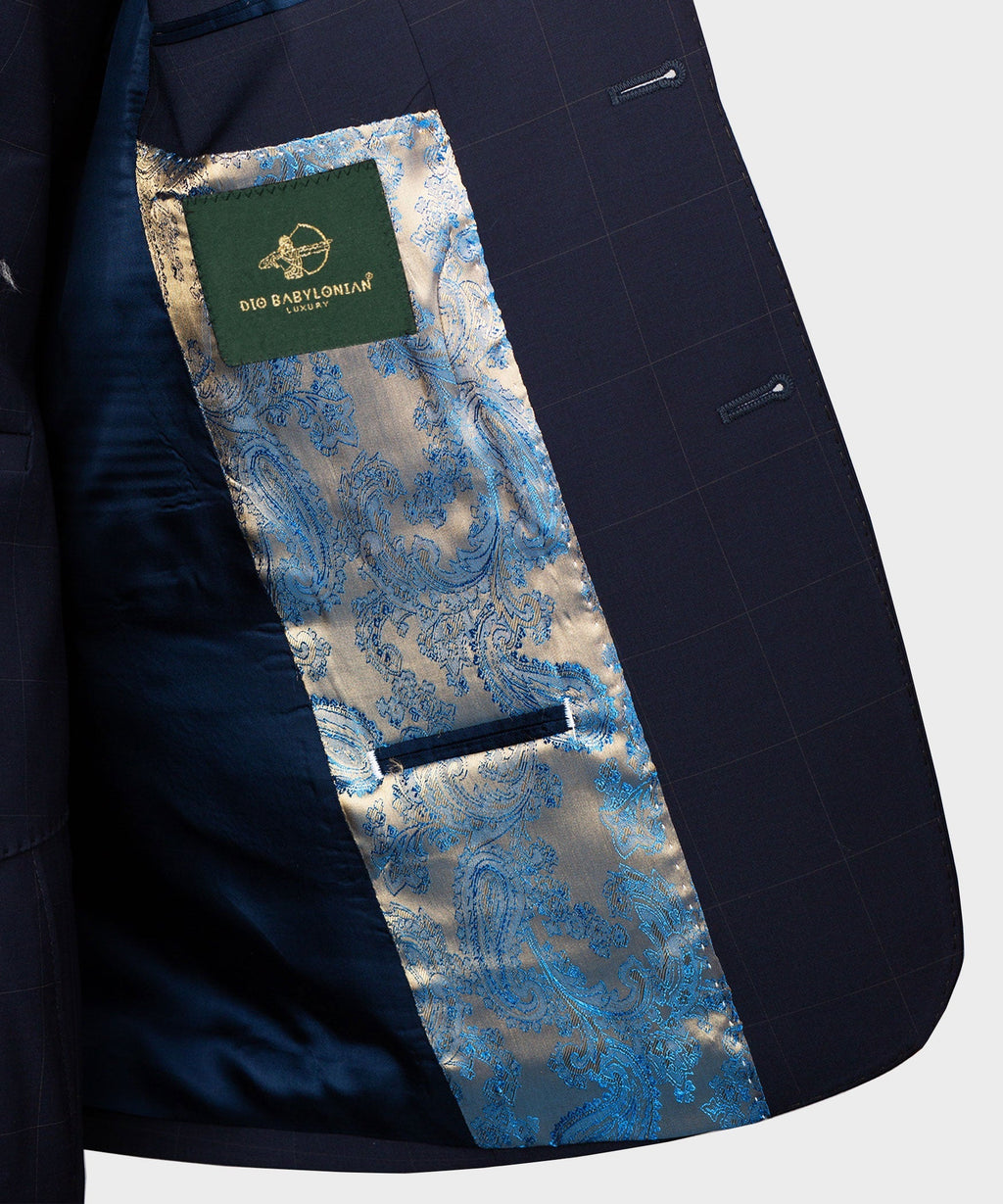 Navy suit jacket lining with blue paisley pocket panel and brand tag