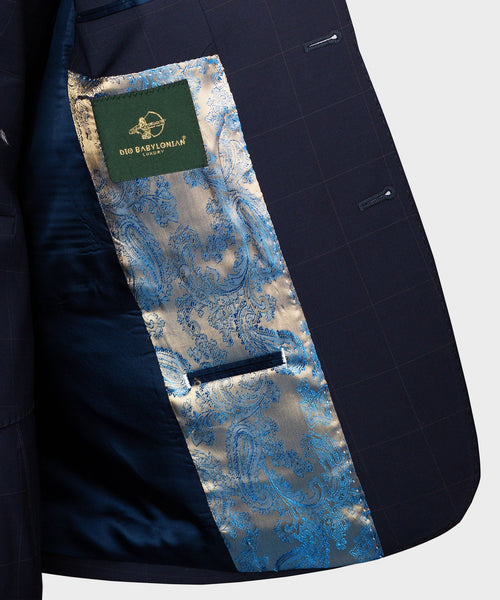 Navy suit jacket lining with blue paisley pocket panel and brand tag