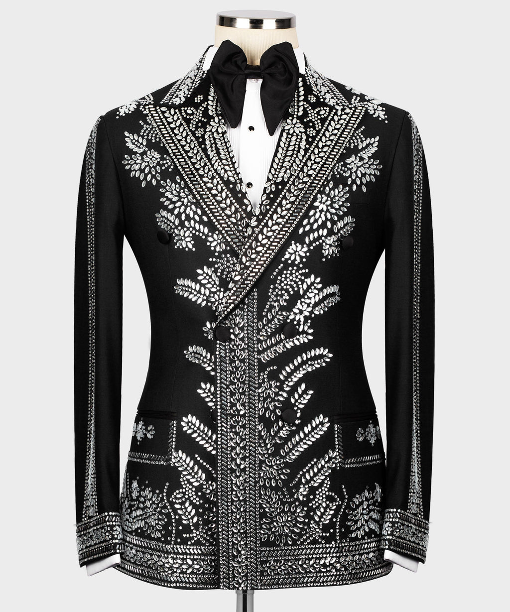 Black tuxedo jacket with silver stone-like embroidery, satin bow tie, peaked lapels