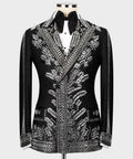 Black tuxedo jacket with silver stone-like embroidery, satin bow tie, peaked lapels