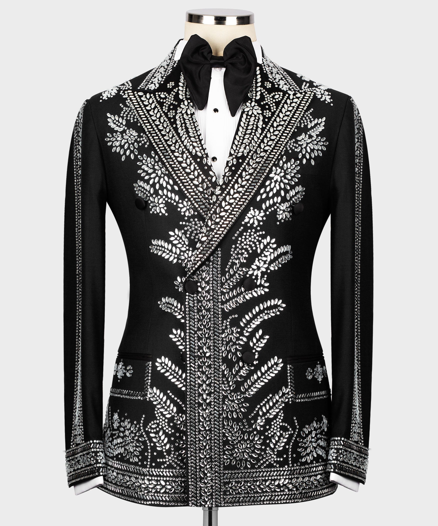 Black tuxedo jacket with silver stone-like embroidery, satin bow tie, peaked lapels