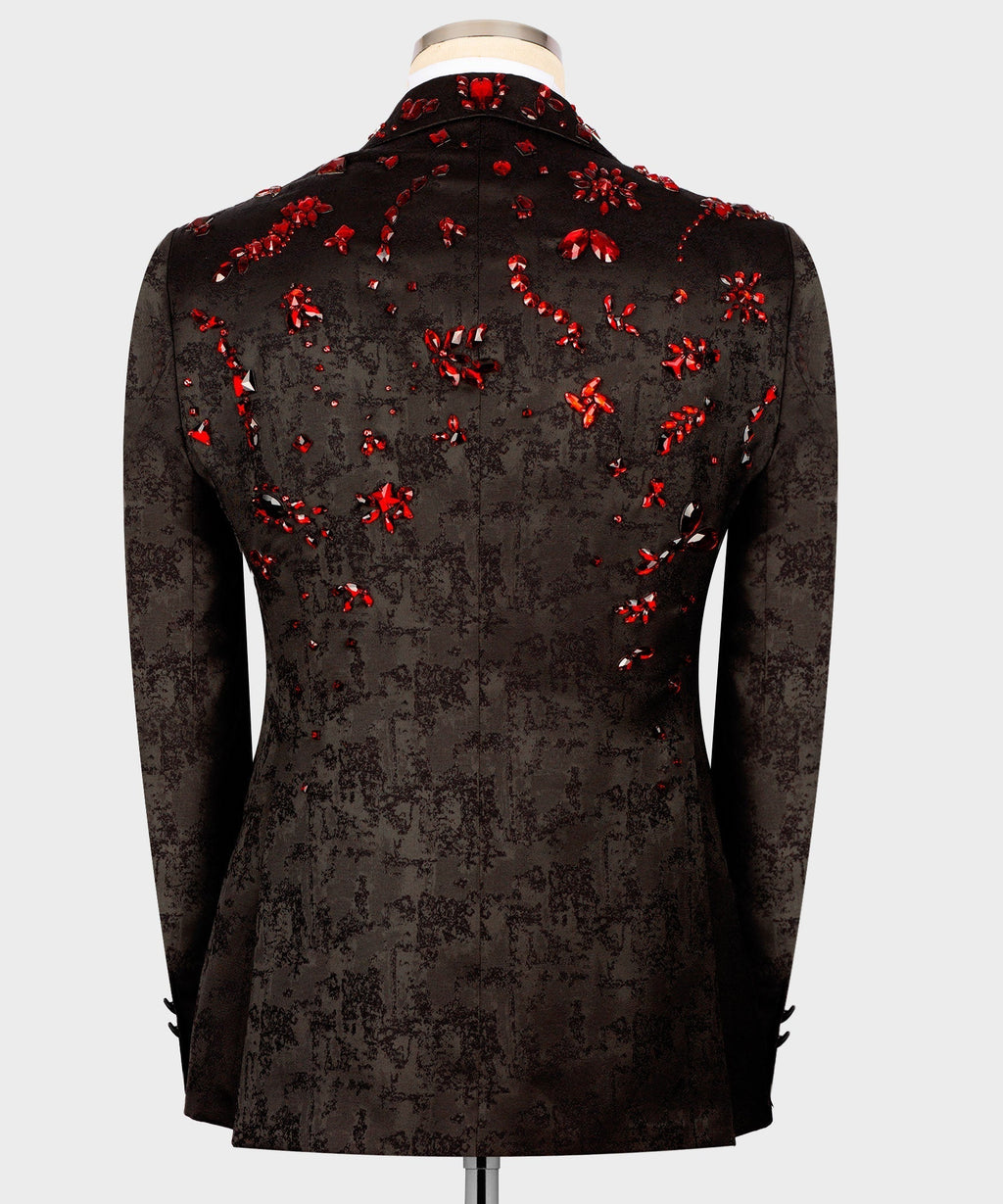 Black tuxedo jacket back view with scattered red stone embroidery across the shoulders