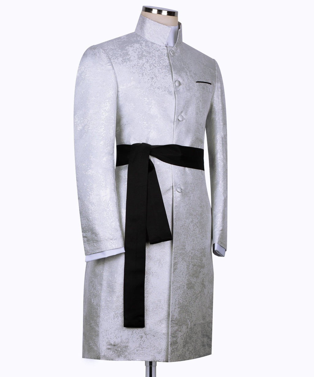 Light textured tuxedo jacket with black long sash belt tied at waist