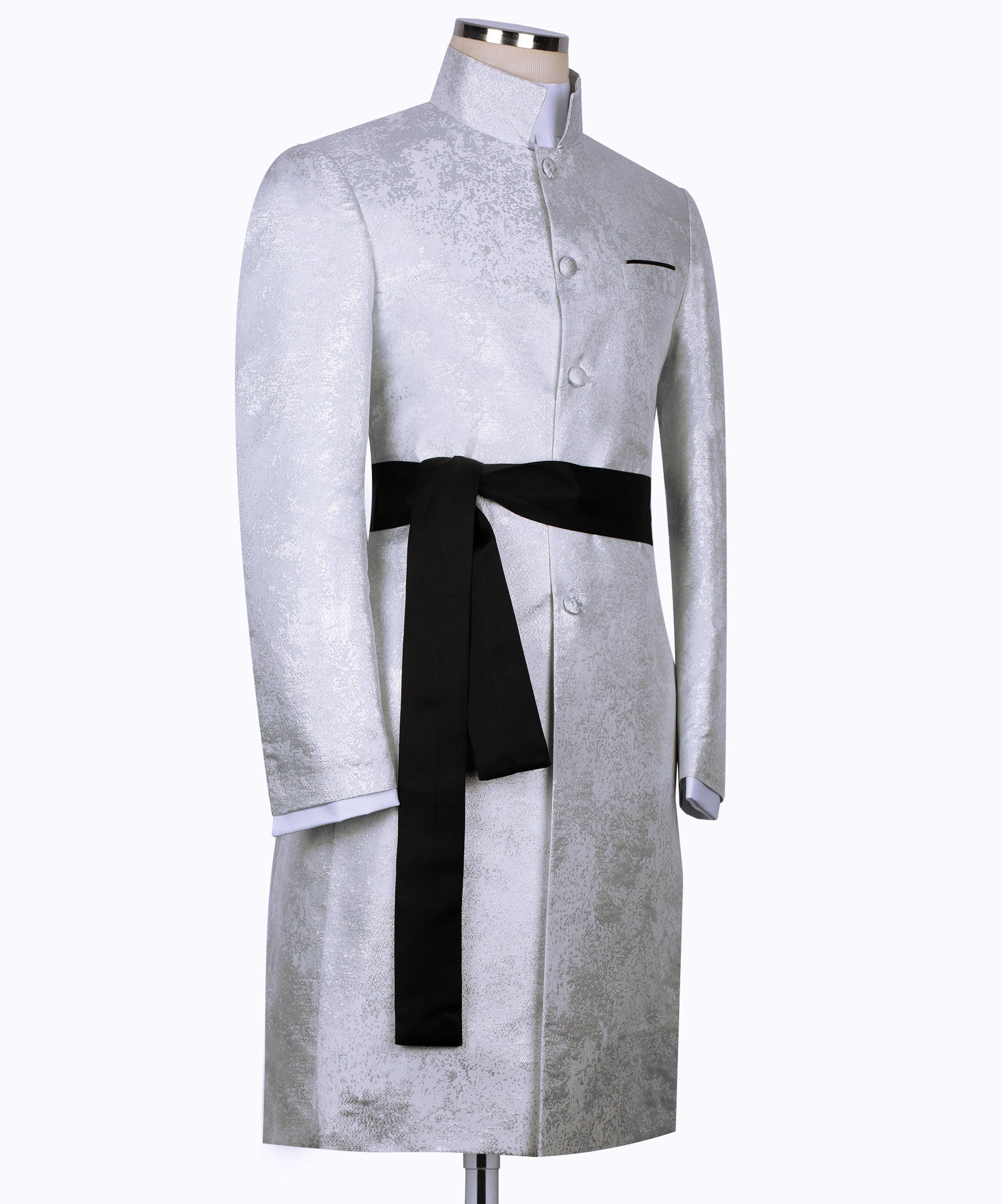 Light textured tuxedo jacket with black long sash belt tied at waist