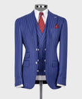 Navy pinstripe suit blazer with vest, red patterned tie, and chest pocket square