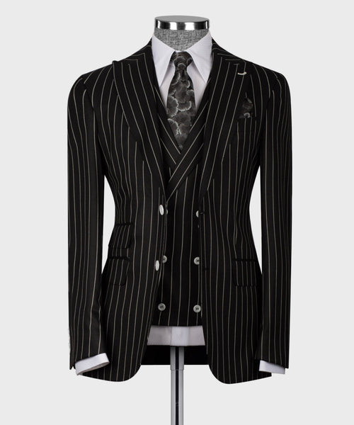 Black pinstriped suit jacket, double-breasted with white dress shirt and patterned tie