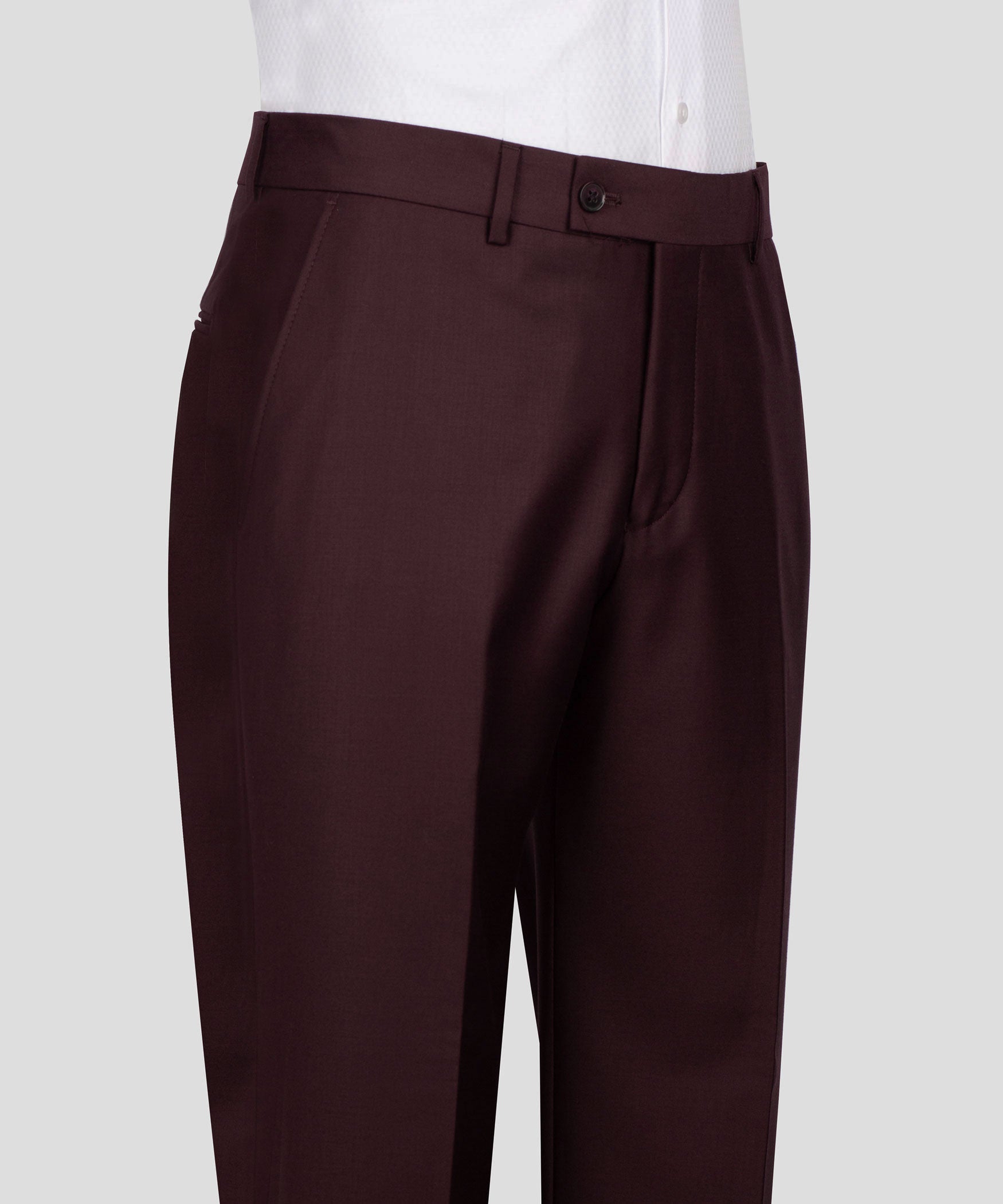 Burgundy tailored trousers with belt loops, button waistband and straight legs