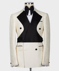 Cream textured tuxedo jacket with black satin vest, bow tie, and white shirt front