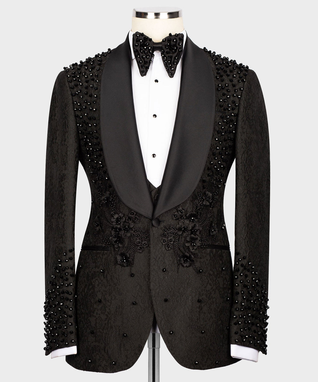 Black tuxedo blazer with satin lapels and bead embroidery on shoulders and chest
