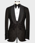 Black tuxedo blazer with satin lapels and bead embroidery on shoulders and chest