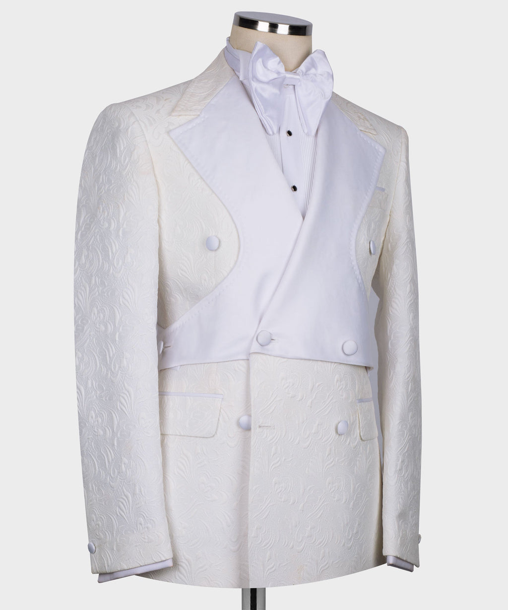 White double-breasted tuxedo jacket and trousers set on mannequin, three-quarter front