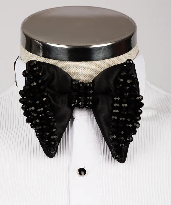Koss Atelier black silk bow tie featuring intricate black bead embellishments on a white formal shirt.