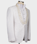 White tuxedo jacket with gold pearl-bead embroidery and satin bow tie detail