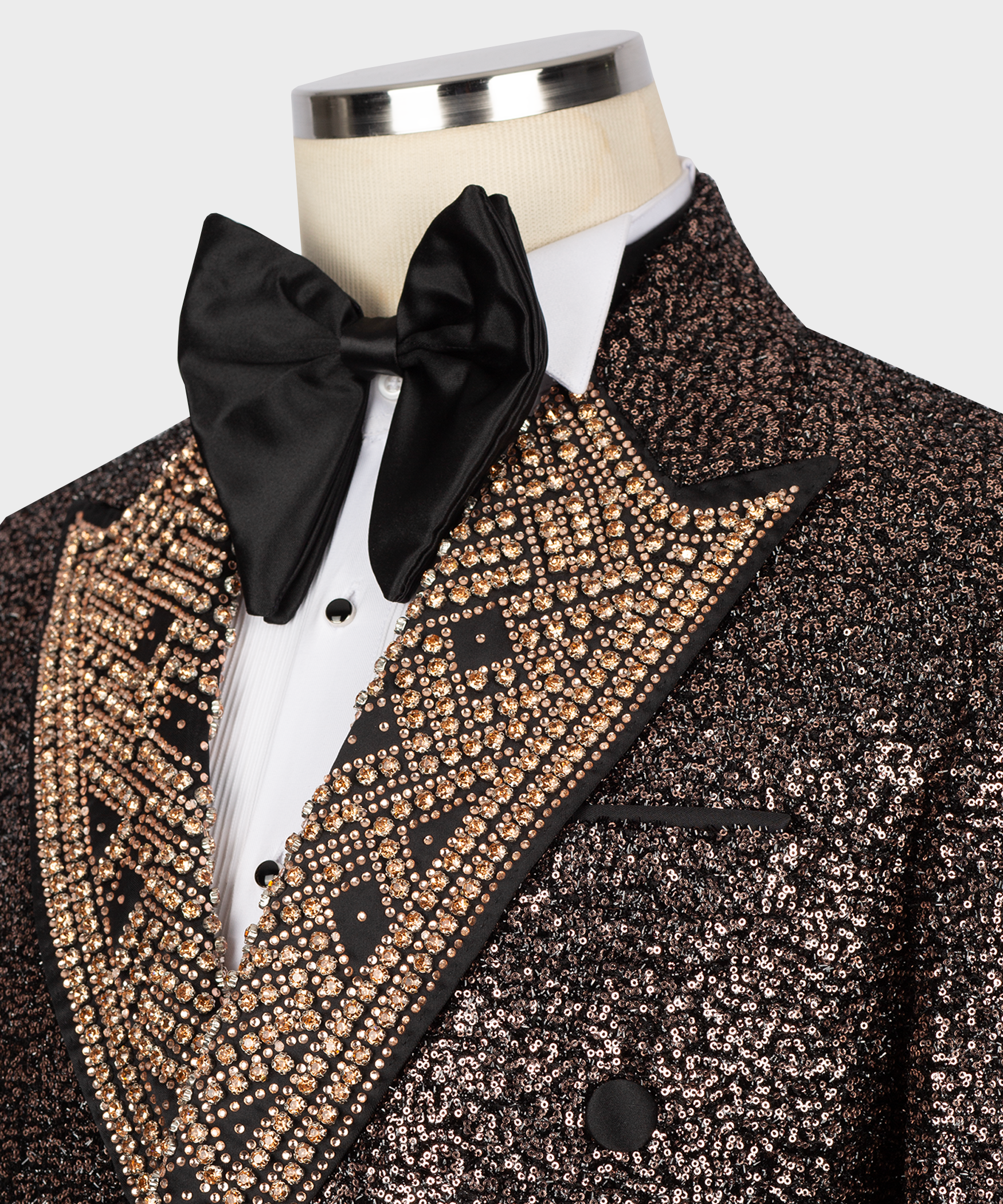 Close-up: black bow tie and stone-embellished V on copper sequin tuxedo jacket