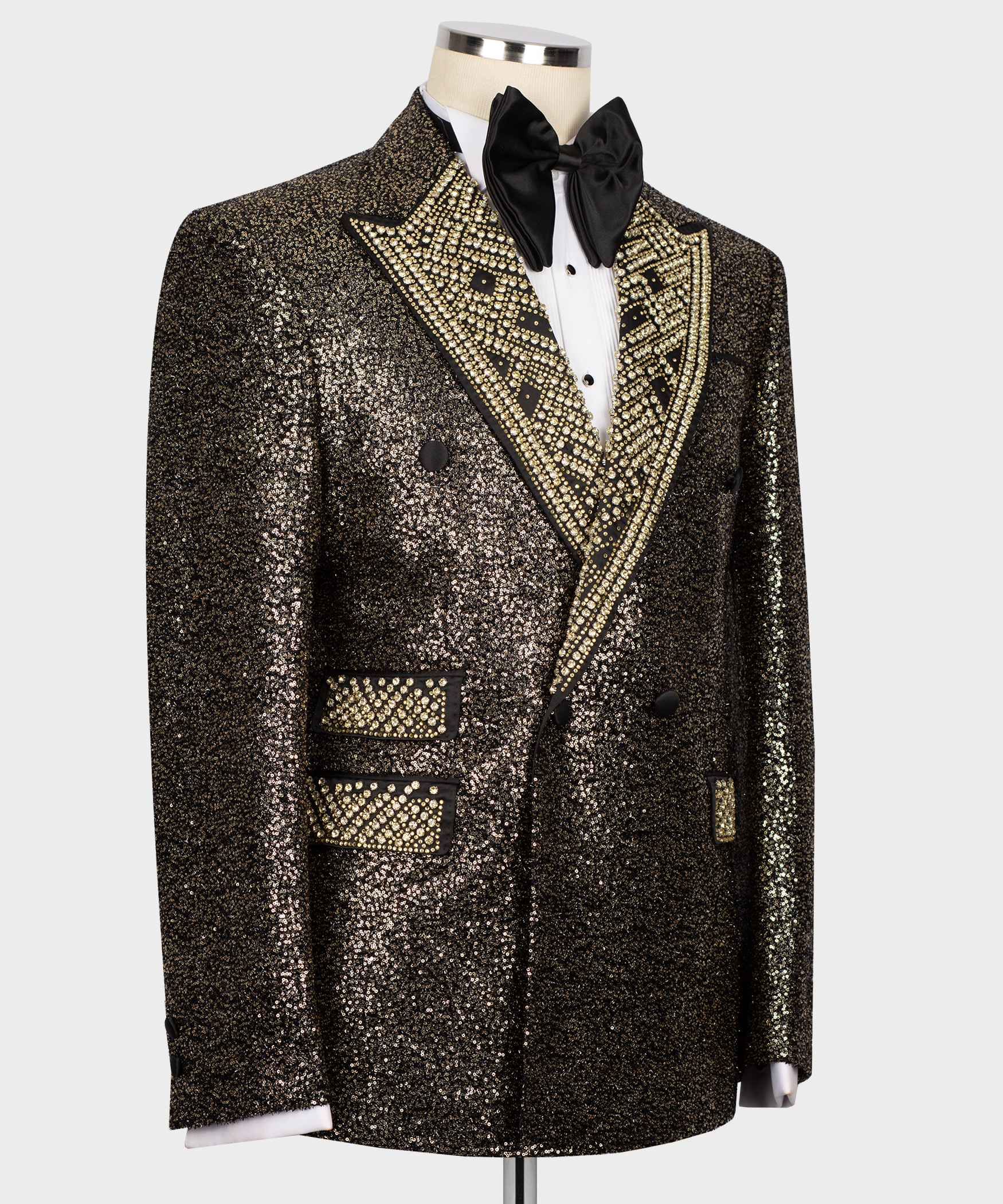Front view of gold sequin tuxedo jacket with black lapels trim and bow tie